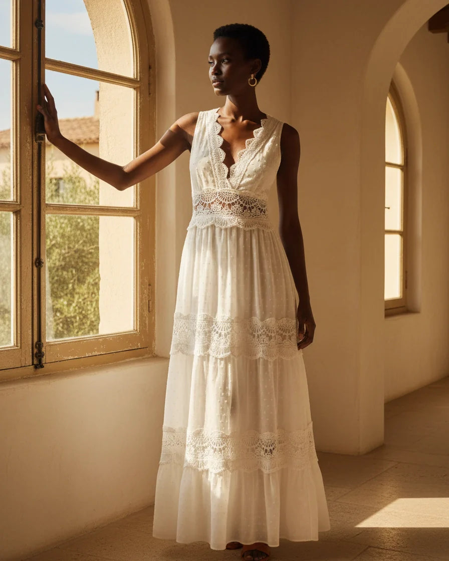 Sleeveless white maxi dress with V-neckline, floral lace bodice, and tiered skirt with lace inserts. - 2