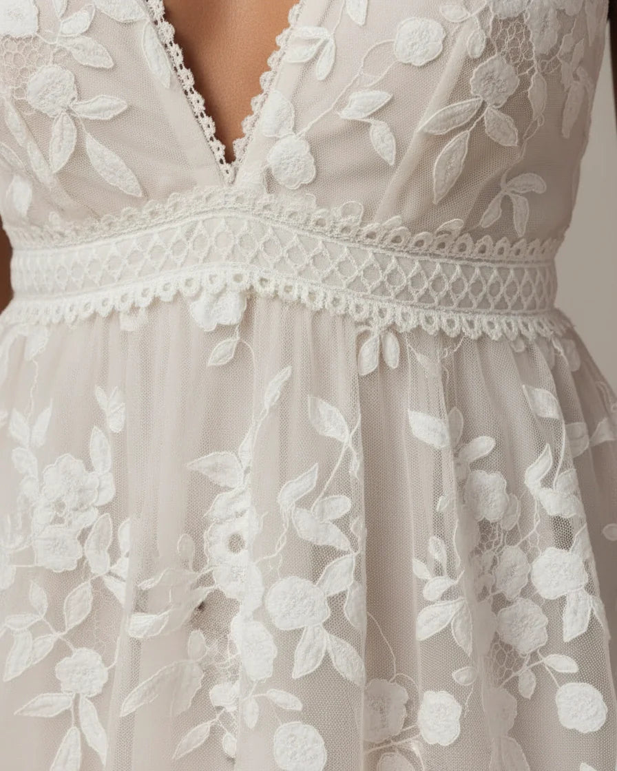 Sleeveless white mini dress featuring floral lace overlay, V-neckline, and scalloped hem. - 5