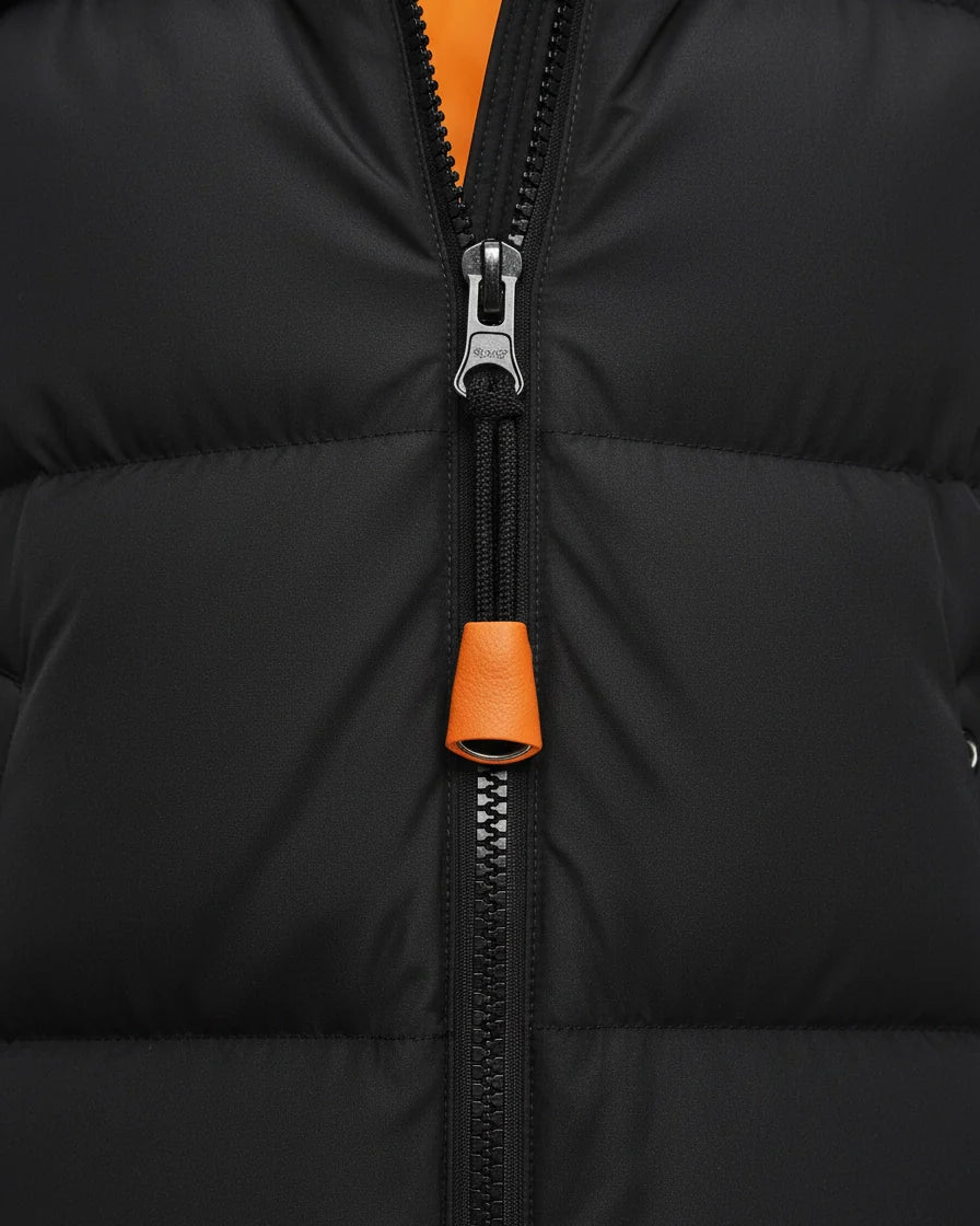 A black long-sleeve midi puffer coat featuring horizontal quilting, a large drawstring hood with orange accents, and a front zipper. - 8