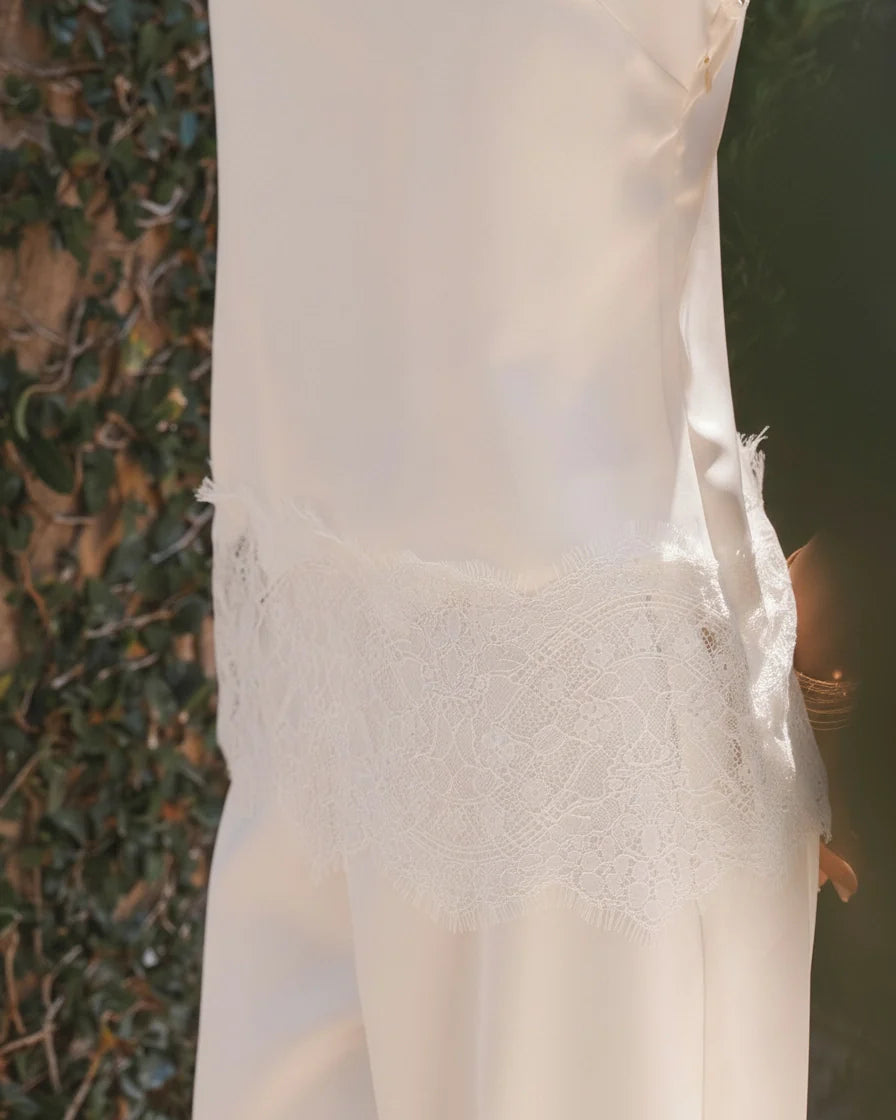 Cream satin camisole with spaghetti straps and eyelash lace trim hem. - 5