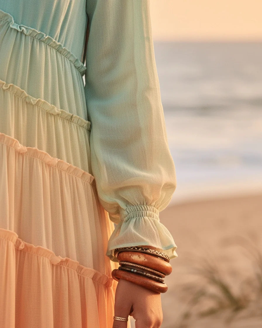 Long sleeve maxi dress with blue, yellow, and coral ombre tones and a tiered ruffled skirt. - 4