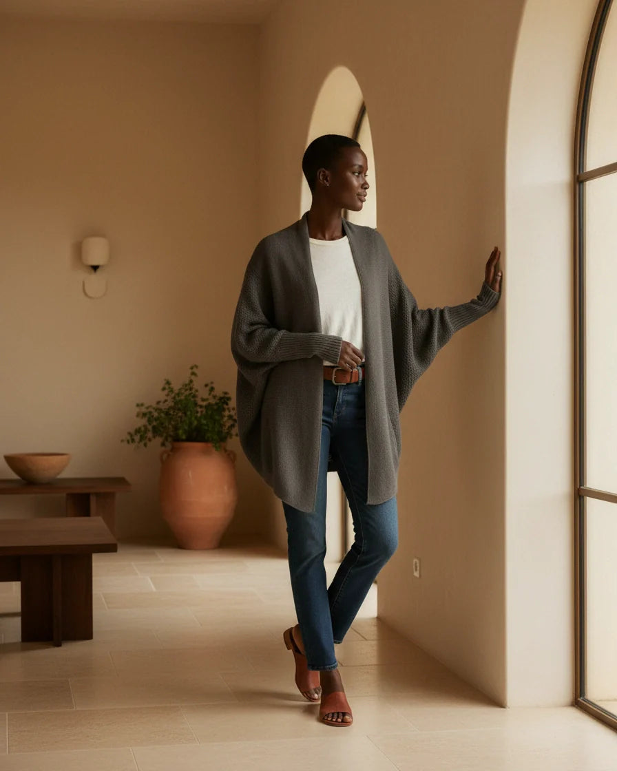 Oversized knit cardigan in army green featuring dramatic batwing sleeves and long ribbed cuffs. - 2