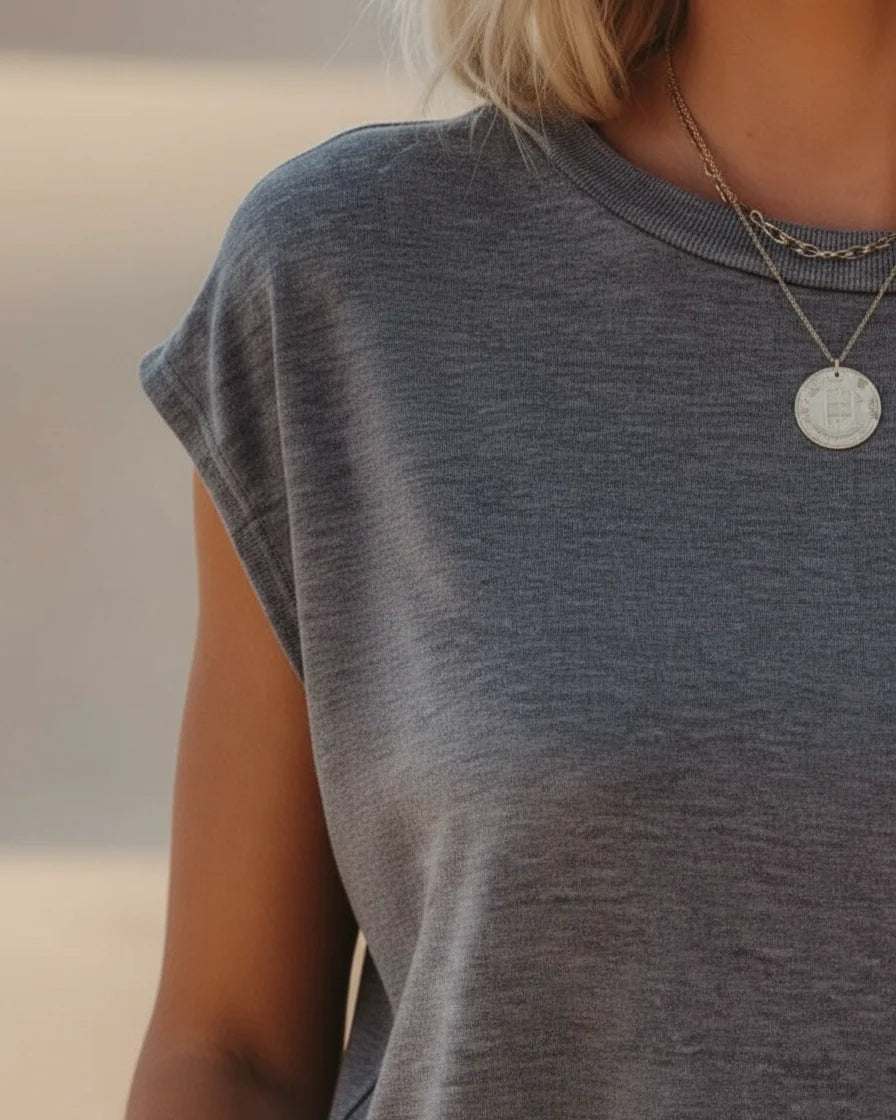 A woman wearing a relaxed-fit short sleeve crew neck t-shirt with a chest patch pocket. - 6