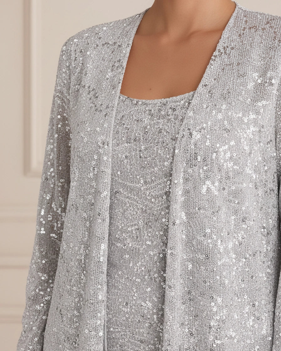 A three-piece silver evening set featuring a sequined lace open jacket, matching square-neck top, and flowing wide-leg trousers. - 6