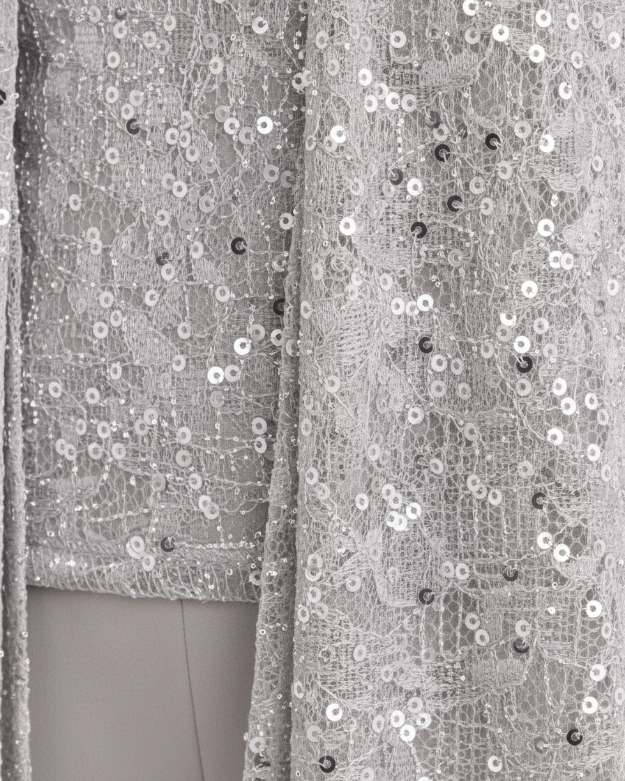 A three-piece silver evening set featuring a sequined lace open jacket, matching square-neck top, and flowing wide-leg trousers. - 8