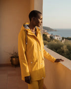 Women Hooded Water-Resistant Rain Jacket with Striped Lining